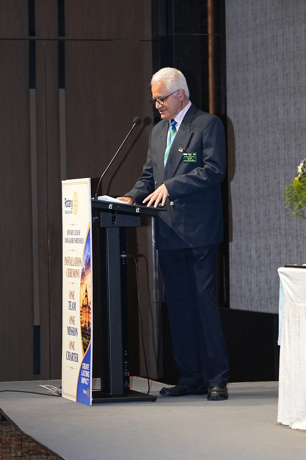 At the lectern at the North Hub installation