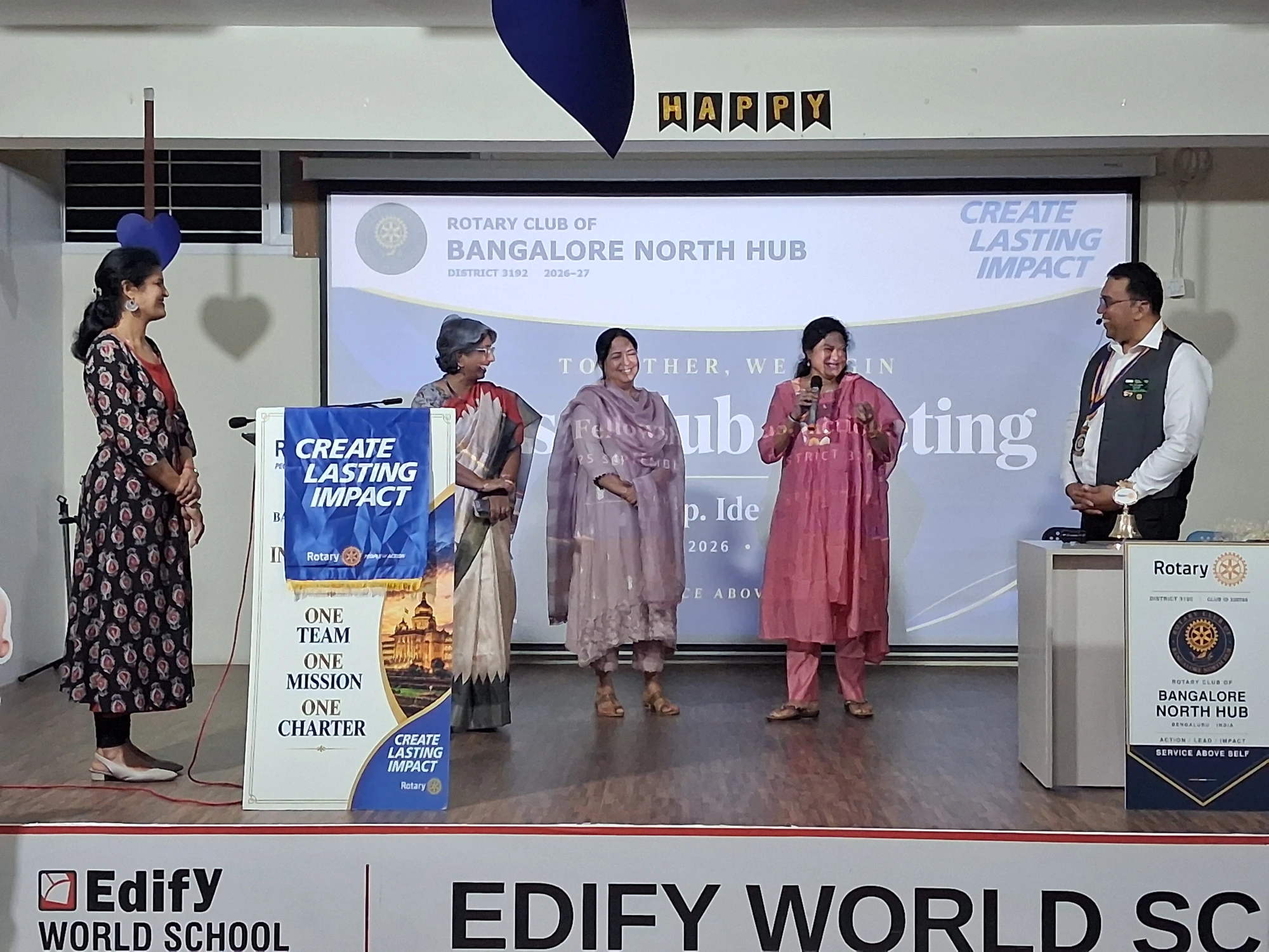 Sharing a moment on stage at the first North Hub club meeting