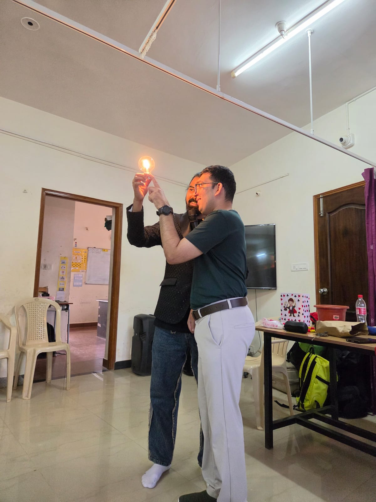 A light-bulb demonstration during the magic show
